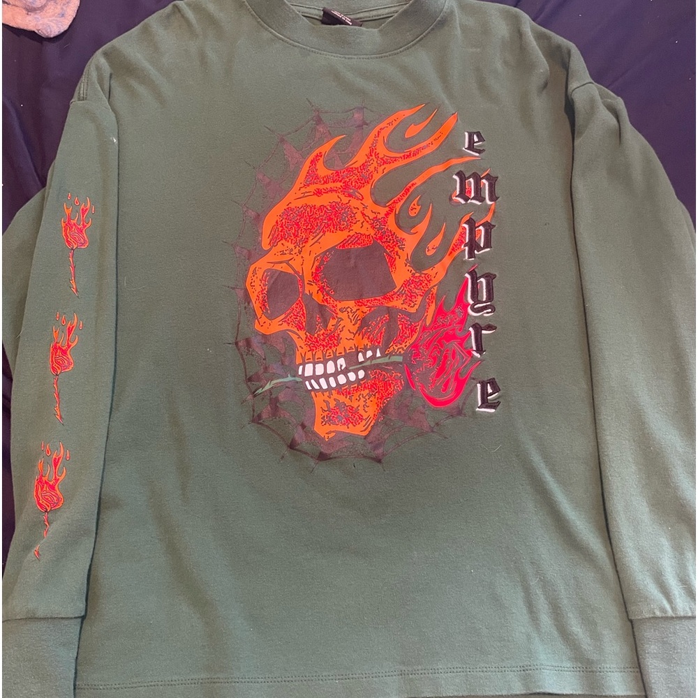 Selling a green empyre shirt wore once